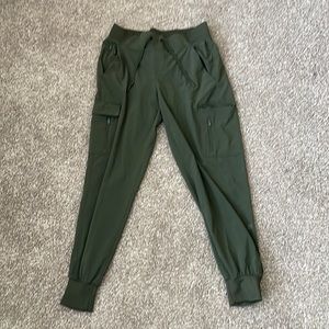 All in motion. Green cargo joggers.